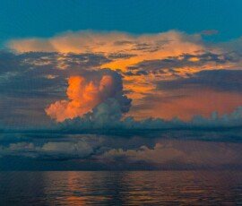 Cloudbank in the Gulf of Mexico, reflecting the sunrise